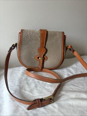 Dooney and Bourke Taupe and Tan Leather Crossbody Saddle Bag